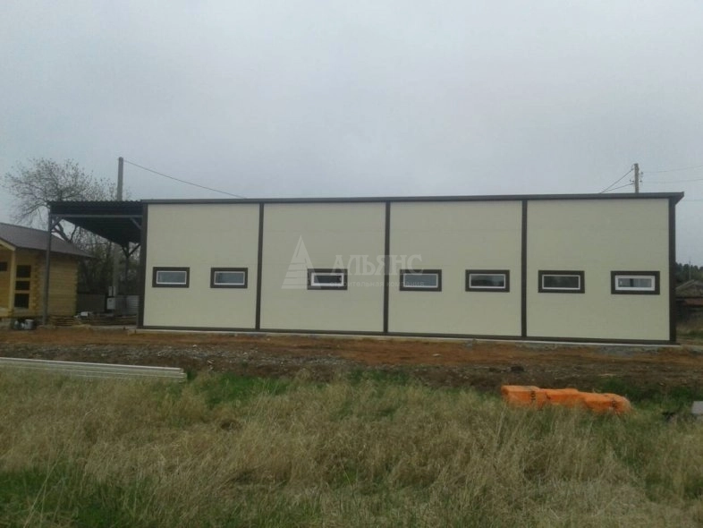 Здание с боксом под гараж из сэндвич-панелей - фото 5